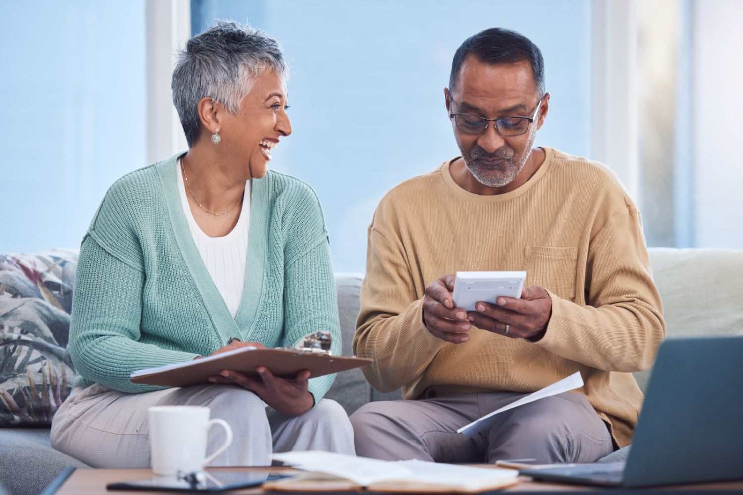 Two people in their 60s planning for retirement