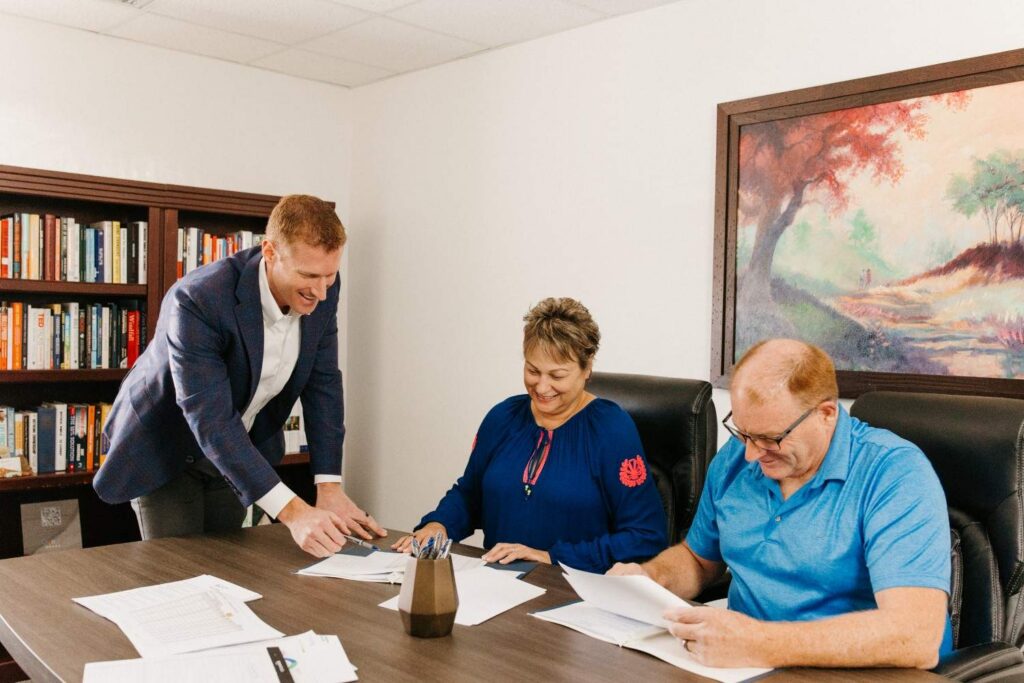 Saint Louis financial advisor Craig Toberman working with clients on their retirement portfolio